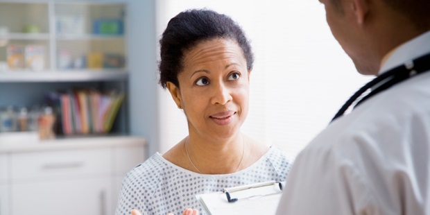 Patient having a conversation with her doctor