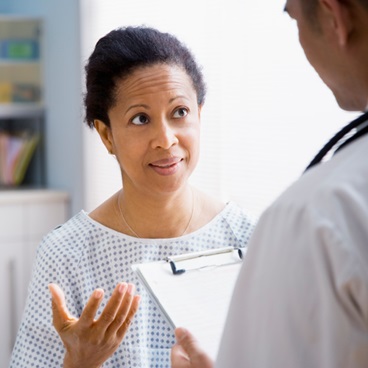 Patient having a conversation with her doctor