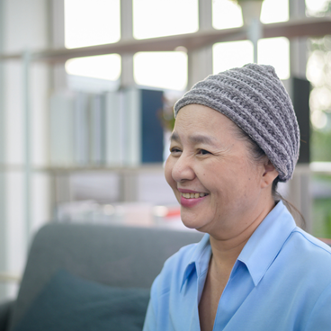 smiling woman with knit cap