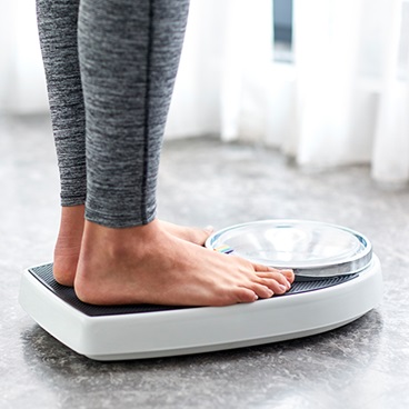 standing on scales womens ankles